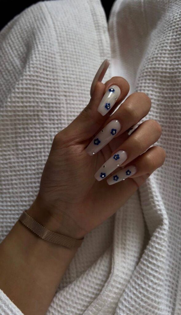 Milky White Nails with Blue Flower Accents: The Ultimate Guide to This Elegant Look