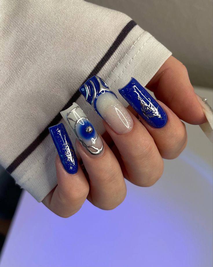 Talismanic Nail Art: Mastering Cobalt Blue, Silver Chrome, and Evil Eye Designs