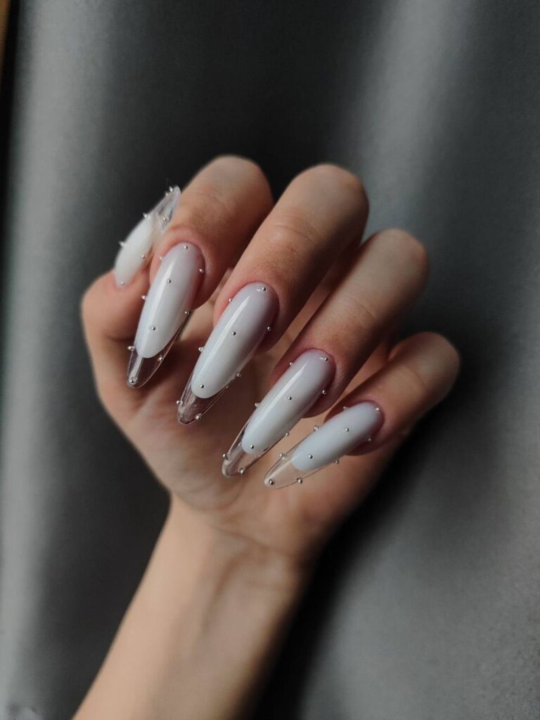Milky White Almond Nails With Chrome Accents: The Ultimate Quiet Luxury Manicure