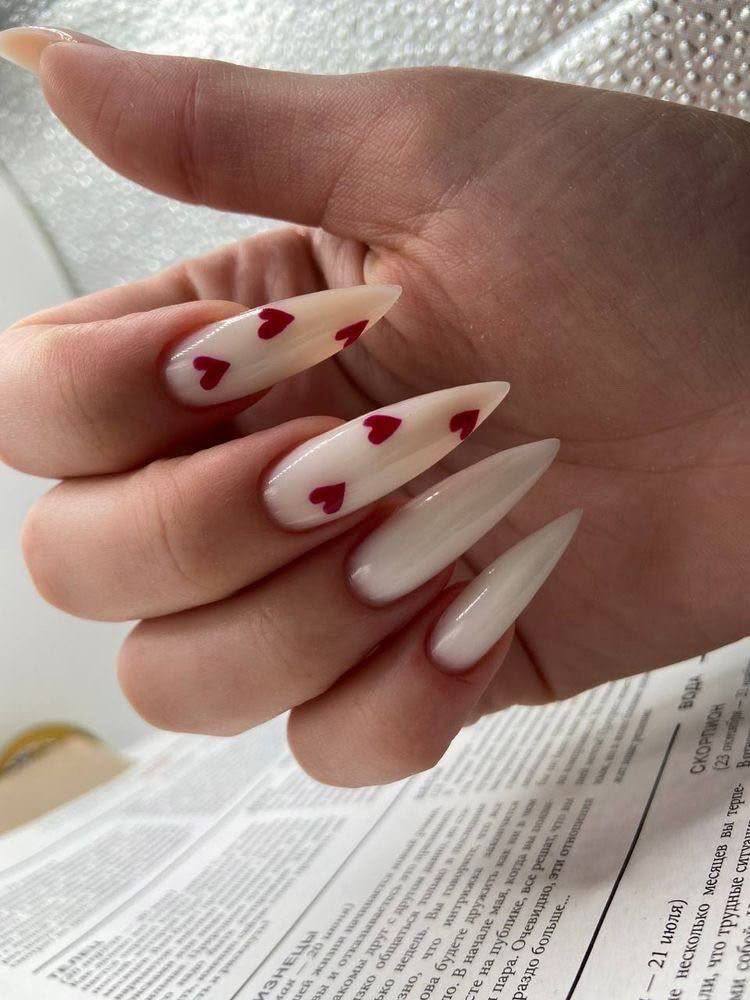 Milky White Nails With Red Hearts: The Perfect Minimalist Manicure Trend