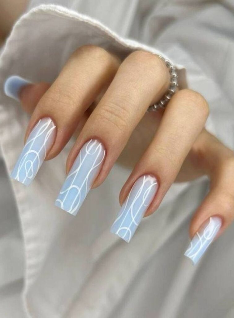 Pale Blue Swirl Nail Art: How to Style and Achieve a Modern Look