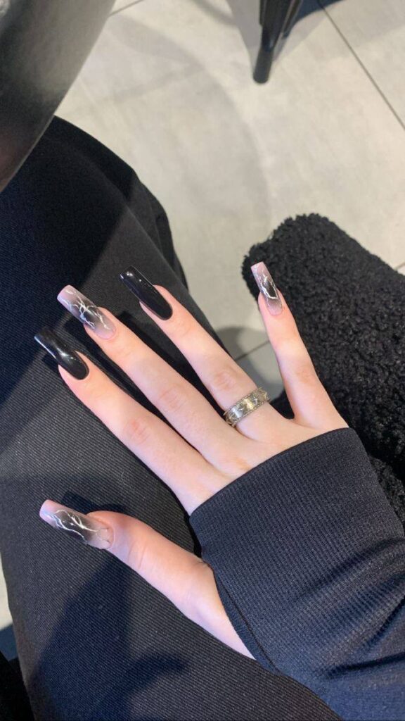 Noir and Chrome: Mastering the Black and Silver Ombré Coffin Nail Trend