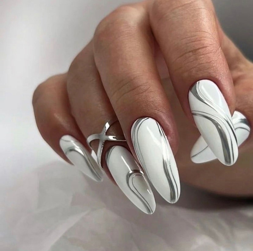 Liquid Silver Swirl Nails: The Top Futuristic Winter Manicure Trend